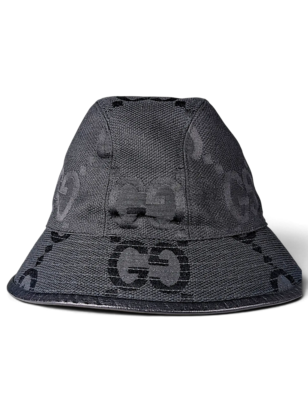 JAKE & IPI black bucket hat featuring a tonal GG monogram pattern and a structured brim.