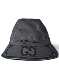 JAKE & IPI black bucket hat featuring a tonal GG monogram pattern and a structured brim.