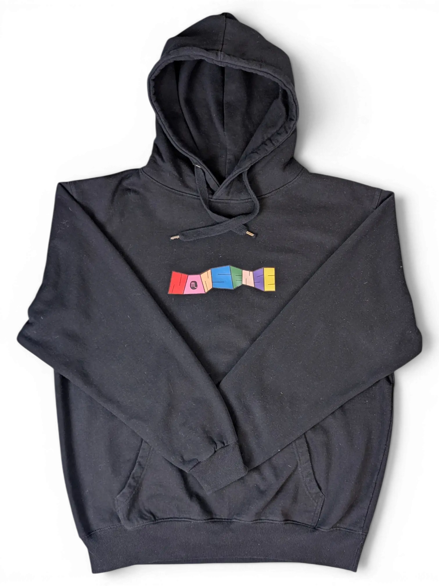 JAKE & IPI black hoodie featuring a colourful Nonsense graphic on the chest with a drawstring hood and front pocket.