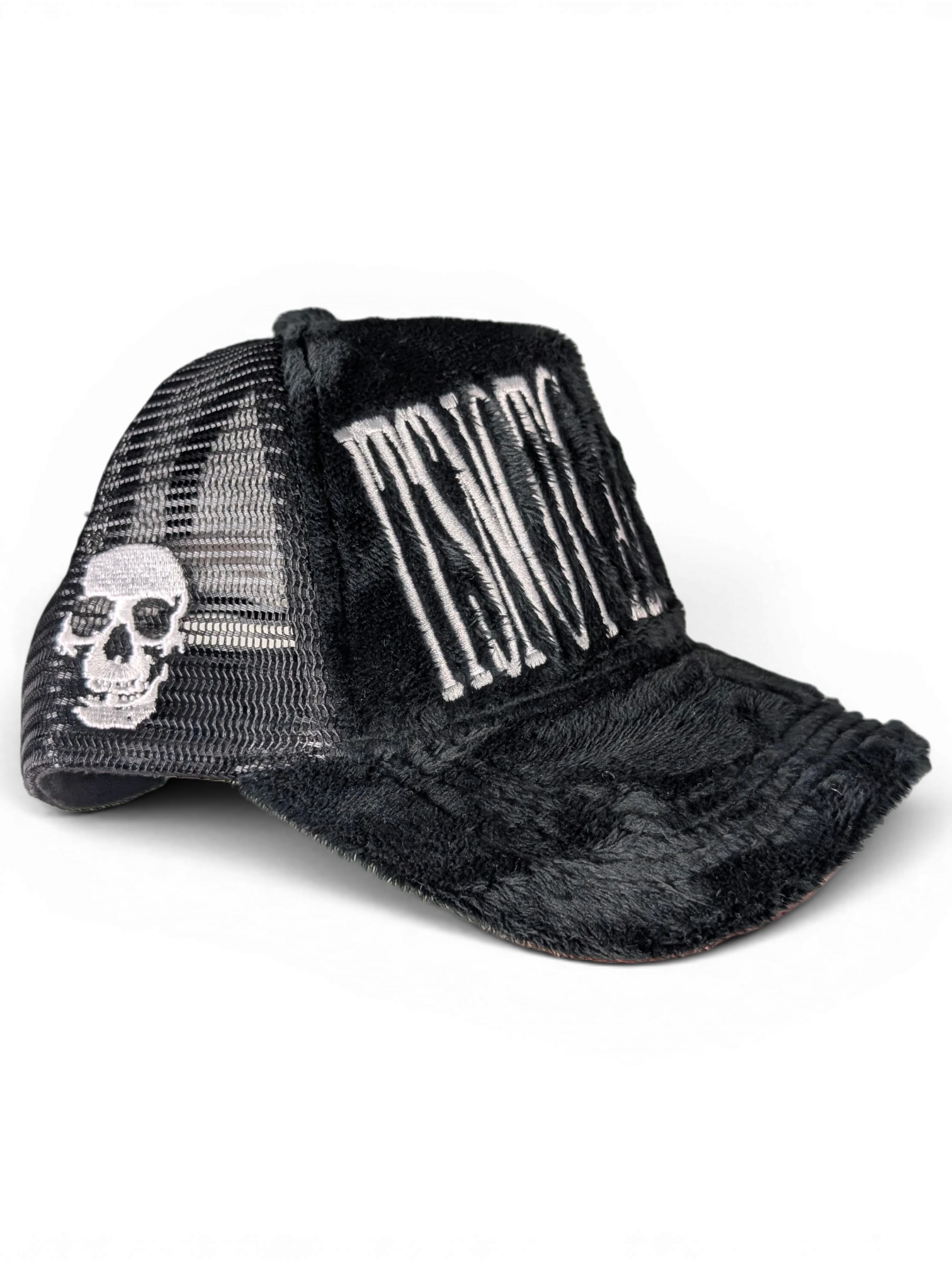 JAKE & IPI black plush trucker hat with white embroidered text and skull detail on the side mesh panel