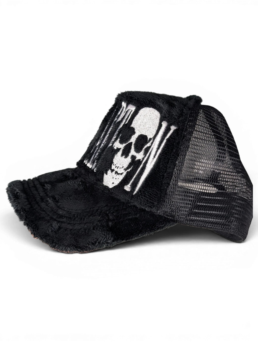 JAKE & IPI IBE Itsnotcartoon black trucker cap with a white embroidered skull design and distressed brim detail.