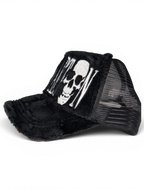JAKE & IPI IBE Itsnotcartoon black trucker cap with a white embroidered skull design and distressed brim detail.