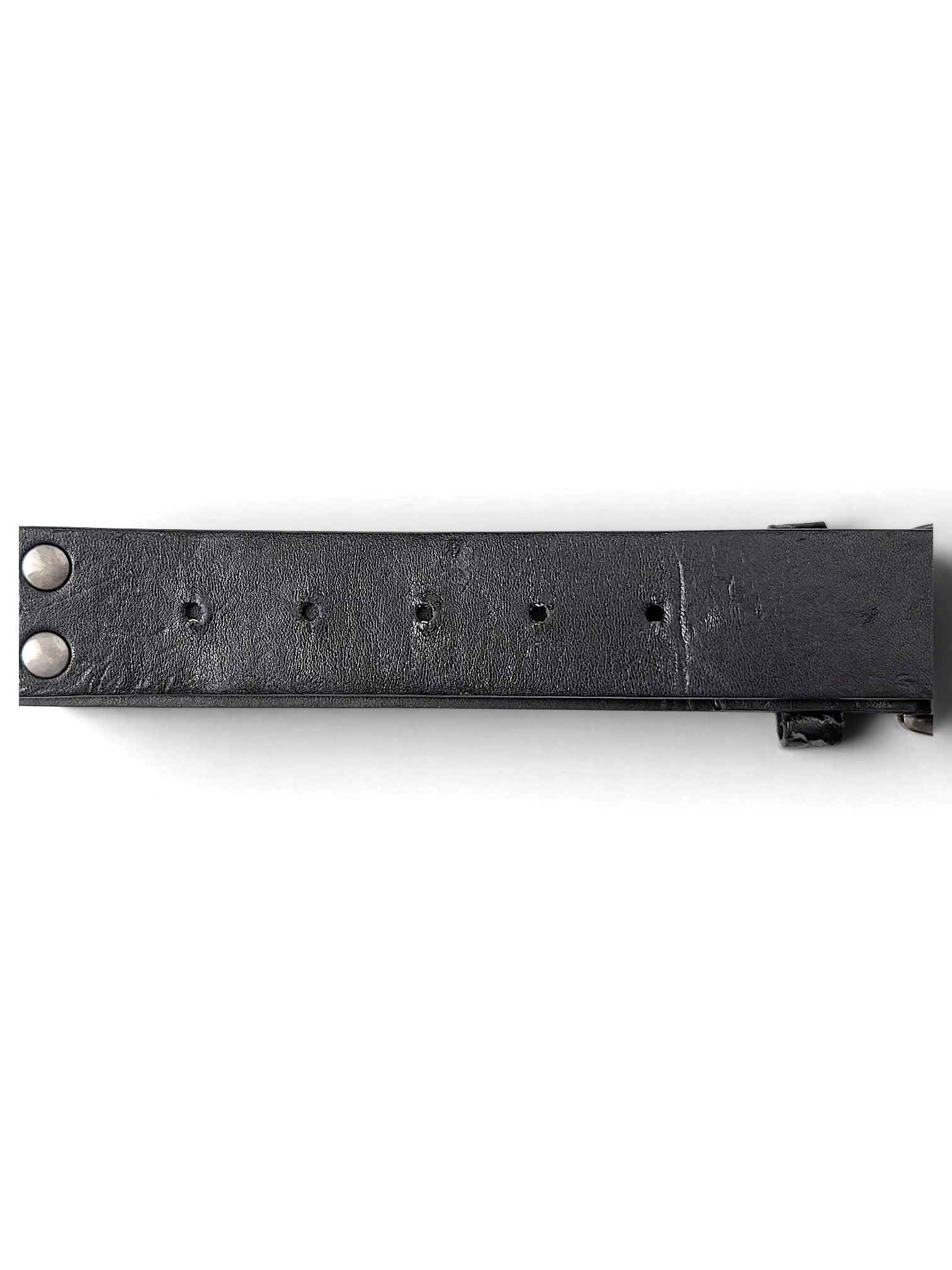 JAKE & IPI black leather belt featuring silver metal studs and a row of adjustment holes on a plain white background.