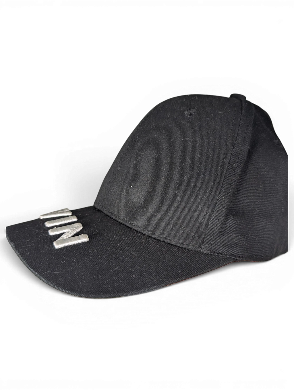 JAKE & IPI black IBE Vain cap with silver metallic lettering on the brim