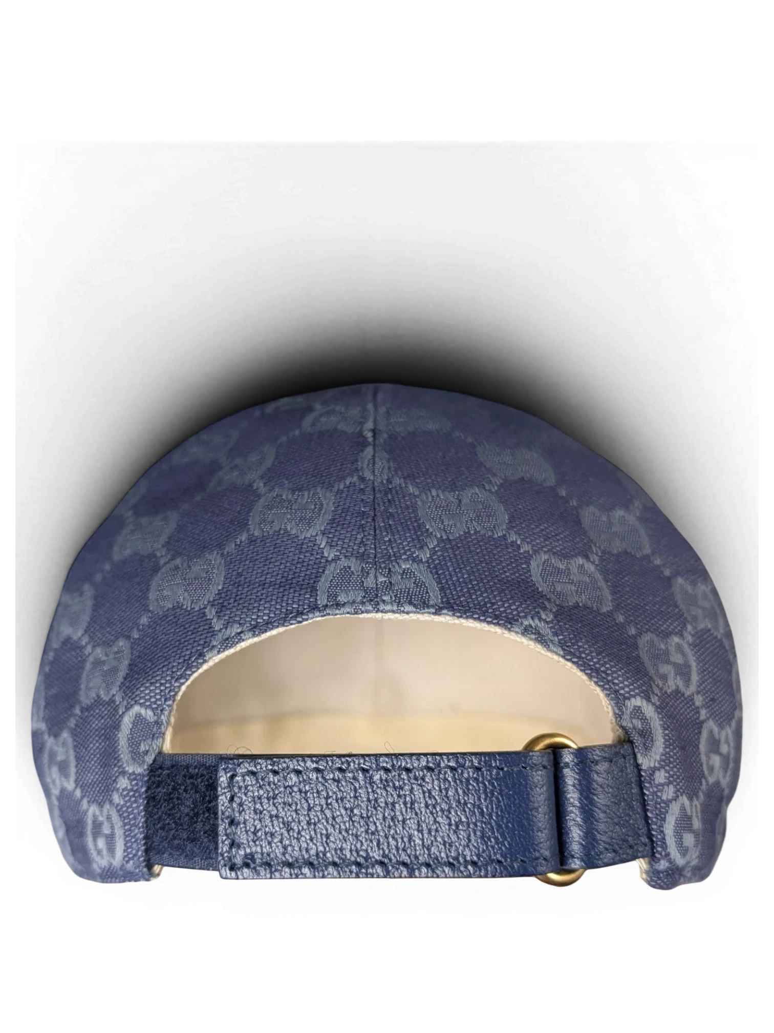 JAKE & IPI blue Gucci baseball cap with monogram pattern and gold-tone adjustable strap detail