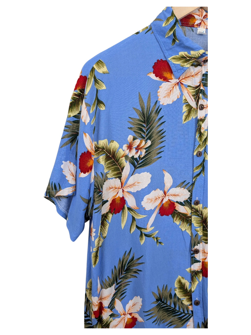 JAKE & IPI blue Hawaiian shirt featuring a tropical floral print with white and red orchids and green palm leaves.