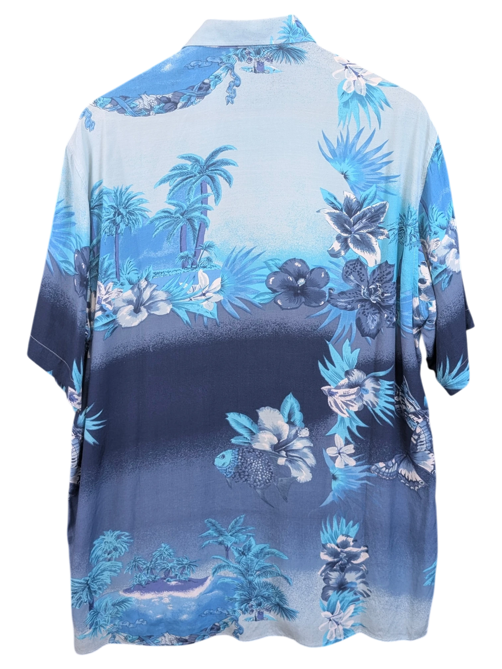 JAKE & IPI Destination Liberté Hawaiian shirt in blue with tropical palm tree and floral print, back view.