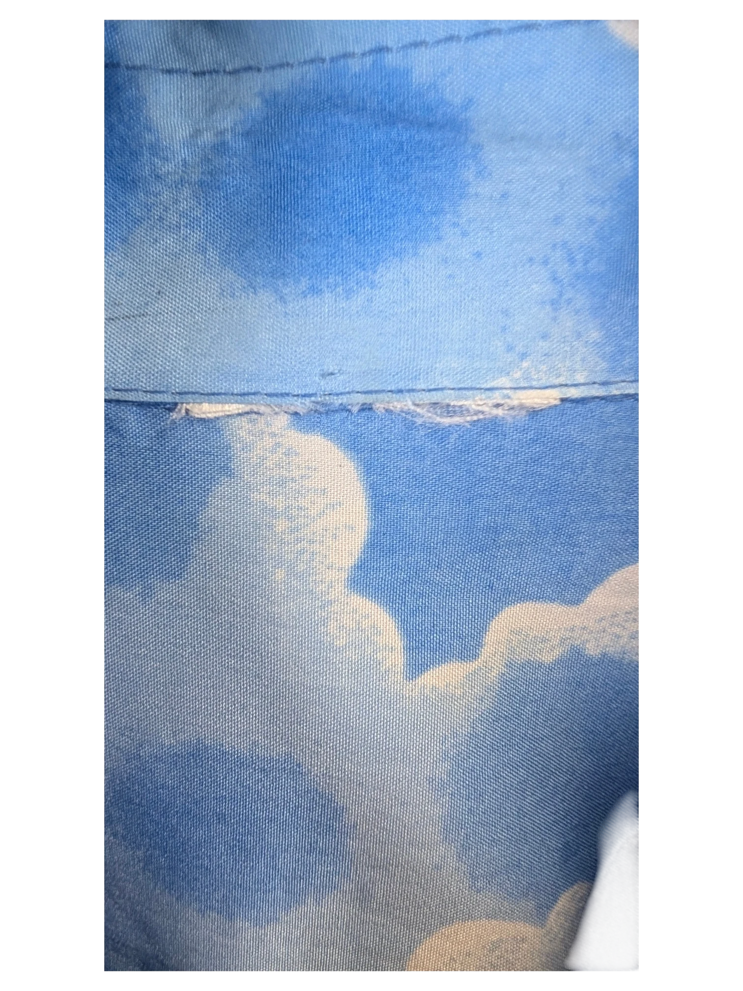 JAKE & IPI blue Hawaiian shirt fabric with a white cloud print and detailed stitching
