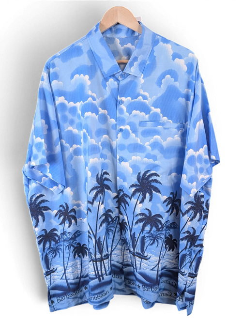 JAKE & IPI blue Hawaiian shirt featuring a tropical palm tree and cloud print on a button-down short sleeve design