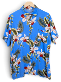 JAKE & IPI blue Hawaiian shirt featuring a vibrant tropical orchid and palm leaf print with a chest pocket