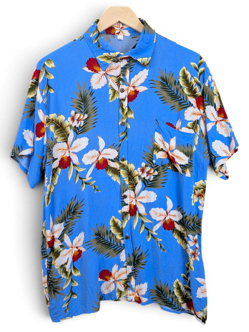 JAKE & IPI blue Hawaiian shirt featuring a vibrant tropical orchid and palm leaf print with a chest pocket