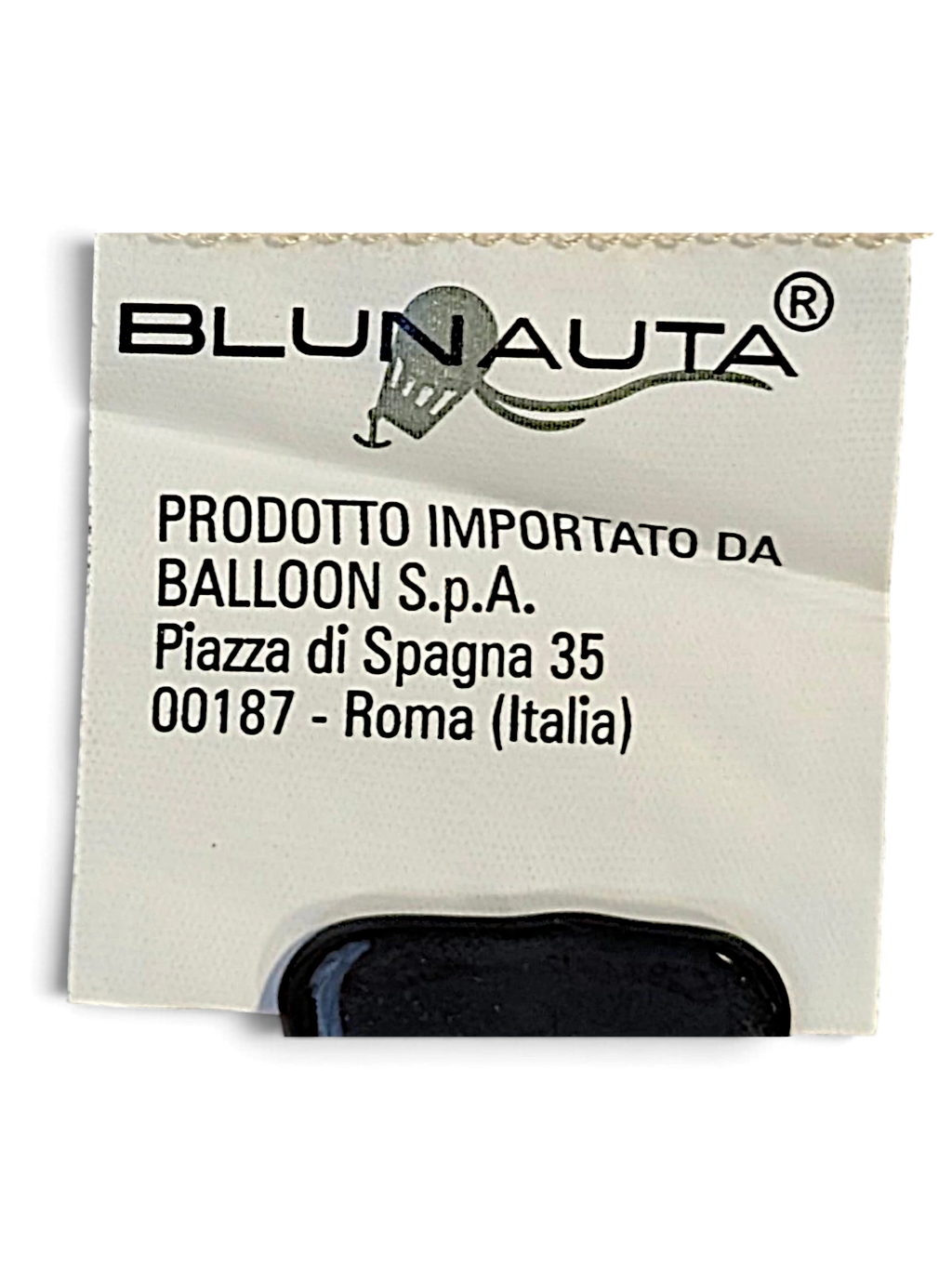 JAKE & IPI Blunauta brand label on ivory silk trousers showing import details and Roma address