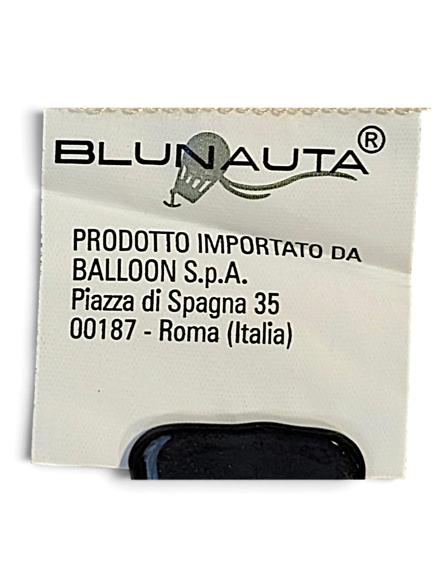 JAKE & IPI Blunauta brand label on ivory silk trousers showing import details and Roma address