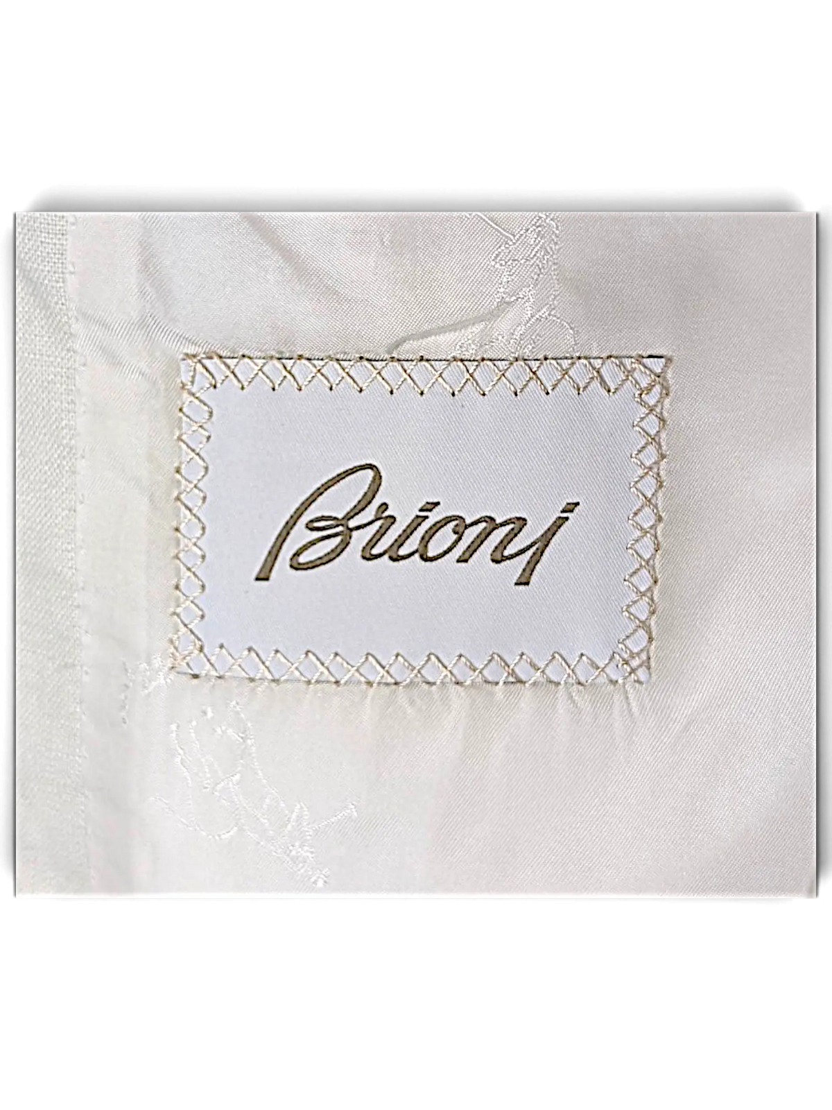JAKE & IPI Brioni linen suit interior label with white fabric and embroidered logo detail