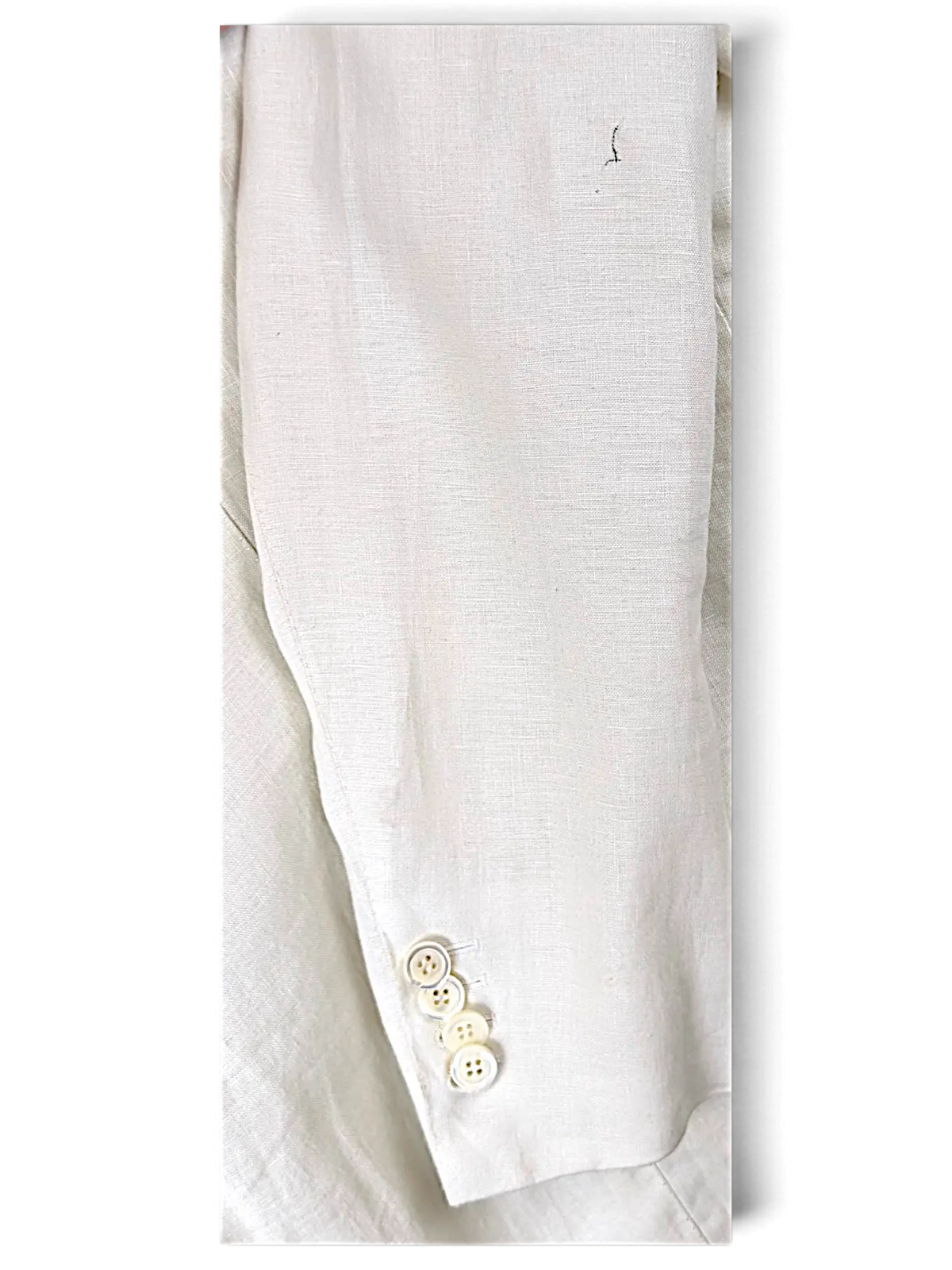 JAKE & IPI Brioni linen suit sleeve in off-white featuring four stacked buttons on the cuff