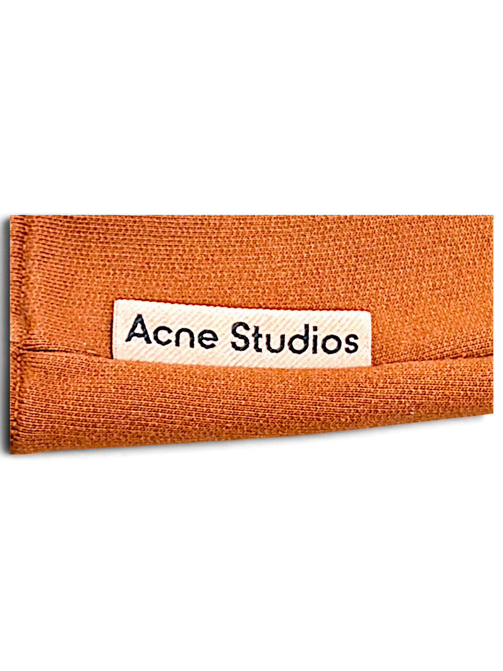 JAKE & IPI brown cotton fabric featuring a white Acne Studios brand label tag