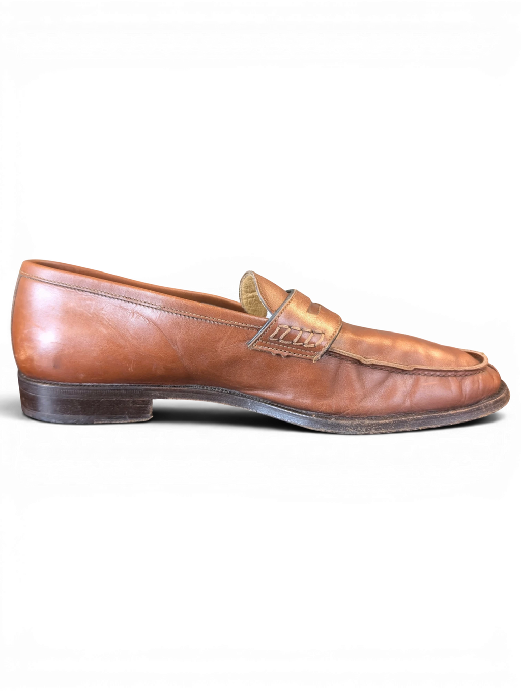 JAKE & IPI brown leather penny loafers with stitched strap detail, side profile view