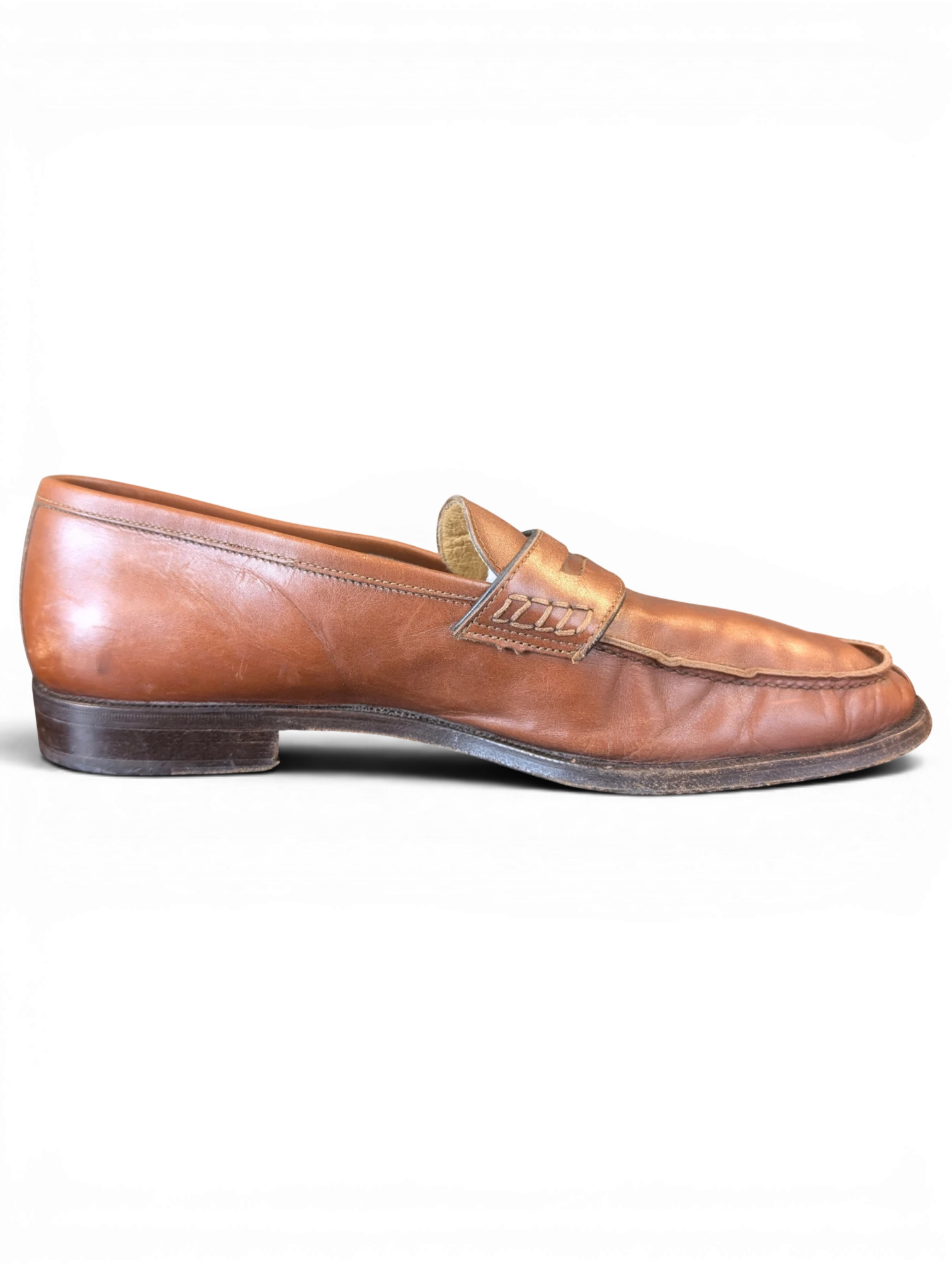 JAKE & IPI brown leather penny loafers with stitched strap detail, side profile view