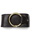 JAKE & IPI brown leather Y2K belt featuring a large circular gold-tone metal ring buckle held by a hand.