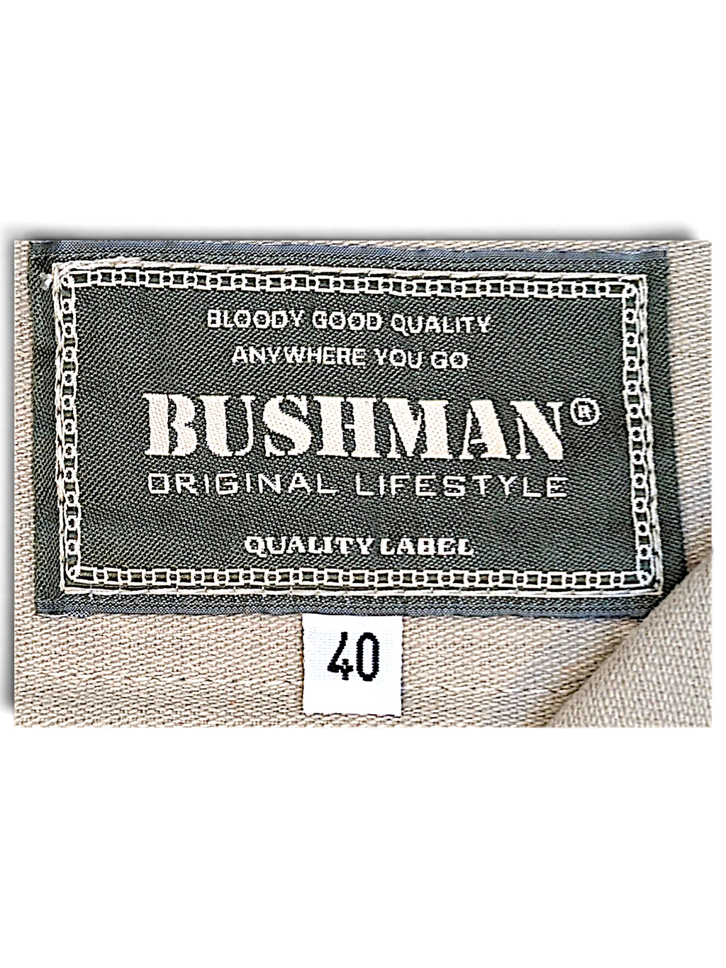 JAKE & IPI Bushman brand label on beige utility trousers with size 40 tag