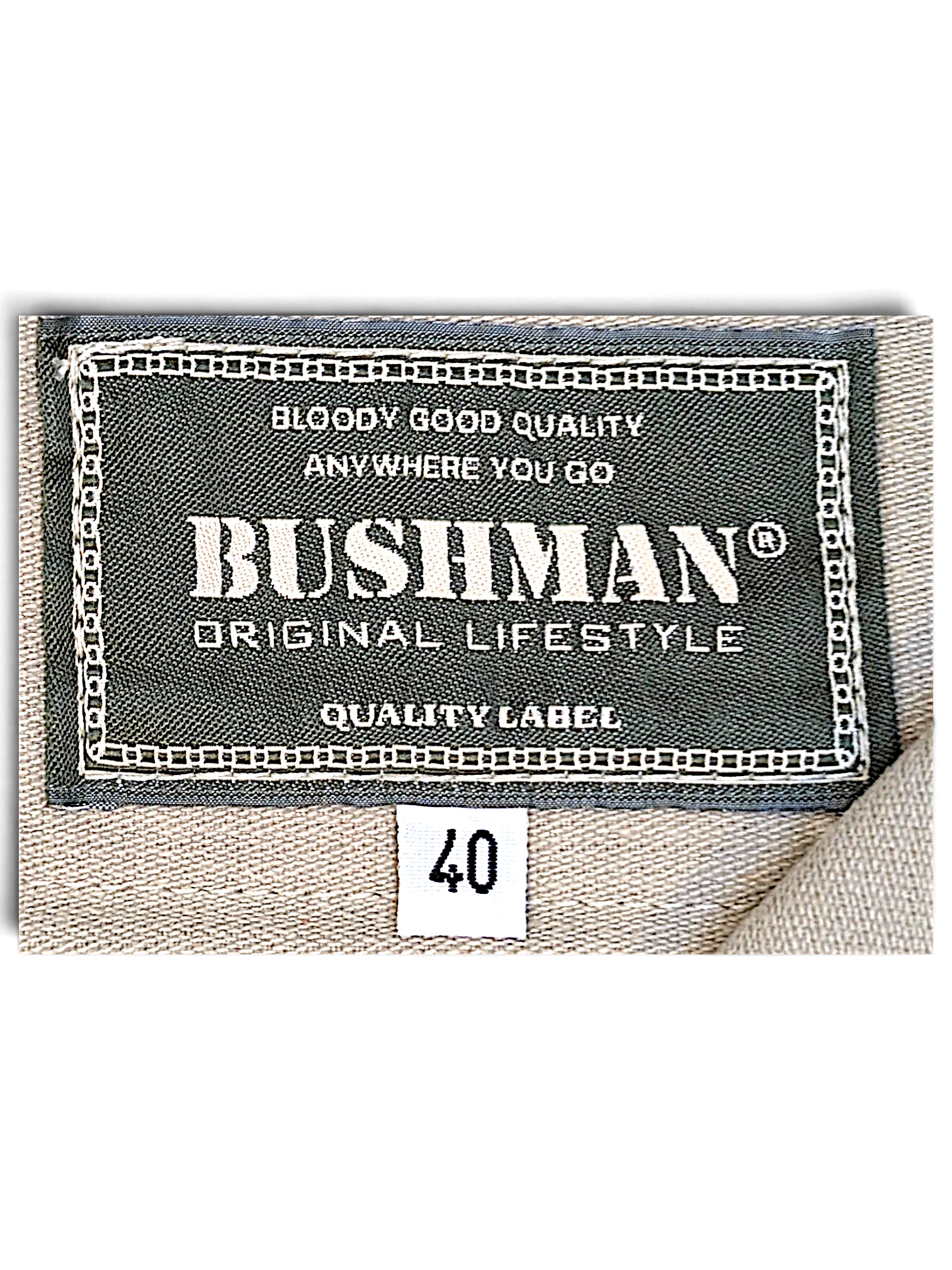 JAKE & IPI Bushman brand label on beige utility trousers with size 40 tag