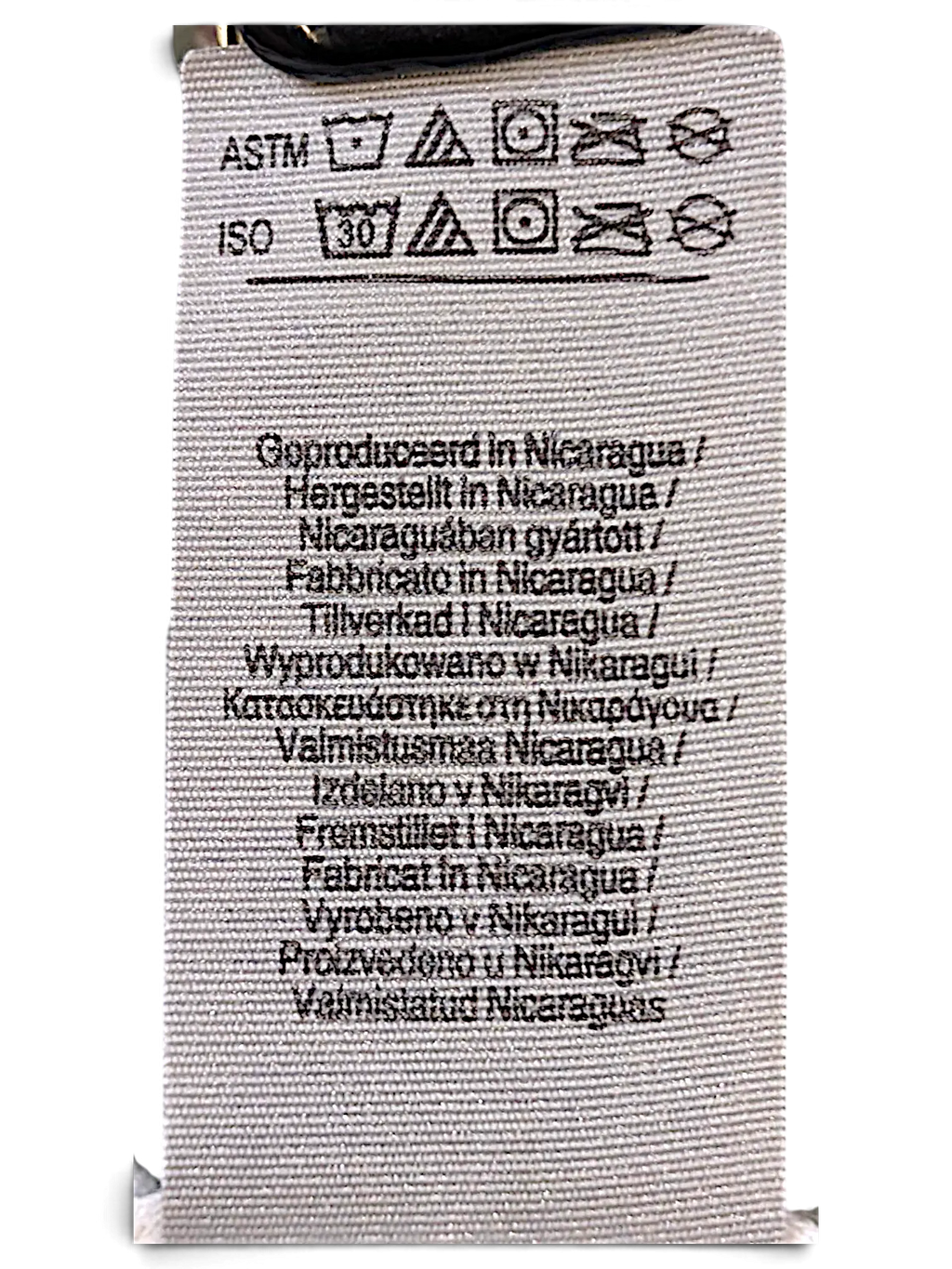 JAKE & IPI IBE Melo glitter T-Shirt fabric care label with washing instructions and origin information
