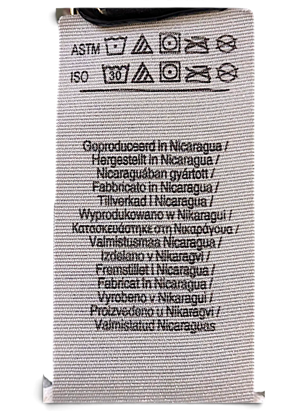 JAKE & IPI IBE Melo glitter T-Shirt fabric care label with washing instructions and origin information
