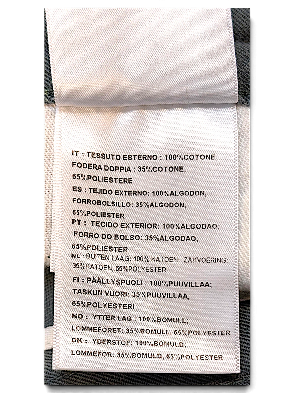 JAKE & IPI Carhartt Salford work pants care label showing cotton and polyester fabric composition details