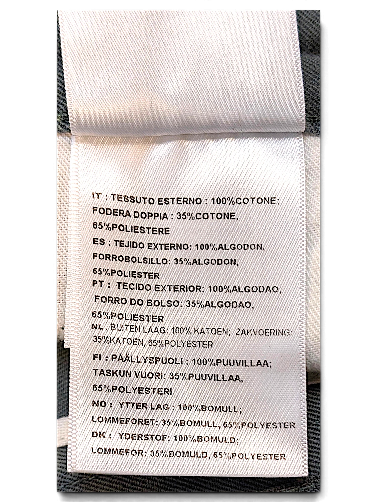 JAKE & IPI Carhartt Salford work pants care label showing cotton and polyester fabric composition details