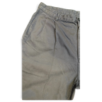 JAKE & IPI käytetyt Carhartt Salford -työhousut, haalistunutta vihreää puuvillaa, suora lahje ja etulaskokset.