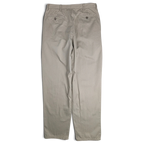 JAKE & IPI Cedarwood State beige cotton trousers with back pockets, shown from the rear view.