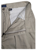 JAKE & IPI Cedarwood State beige cotton trousers with double front pleats and zipper fly detail.