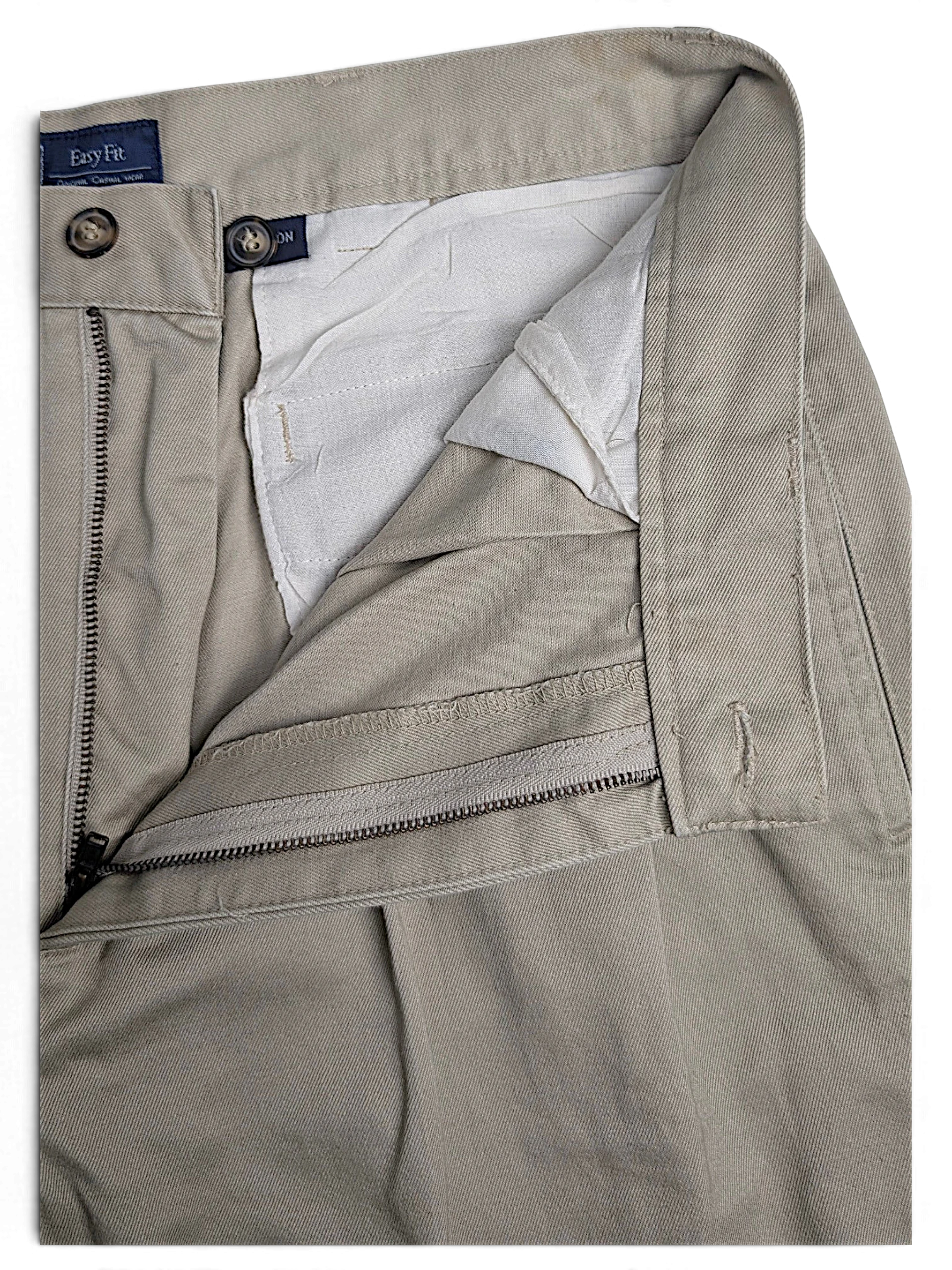 JAKE & IPI Cedarwood State beige cotton trousers with double front pleats and zipper fly detail.