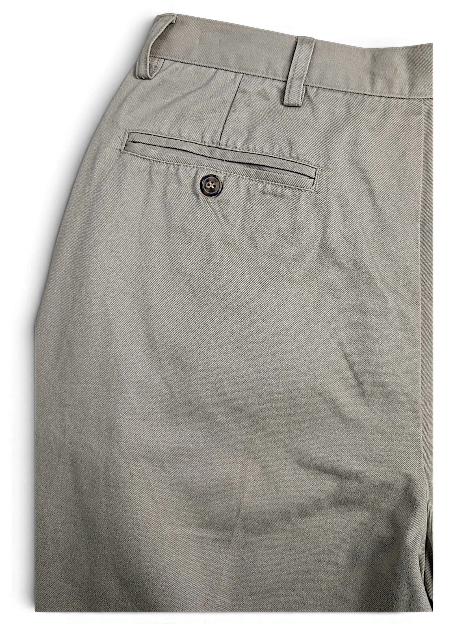 JAKE & IPI Cedarwood State beige cotton trousers featuring a rear buttoned welt pocket and belt loops