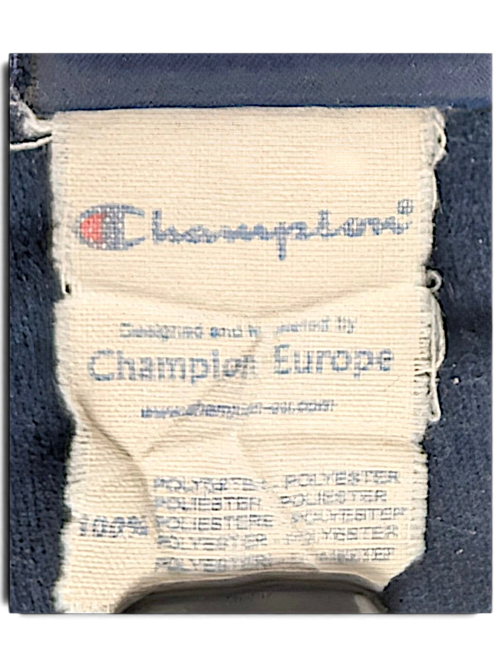 JAKE & IPI Champion Europe track pants care label showing polyester composition and branding
