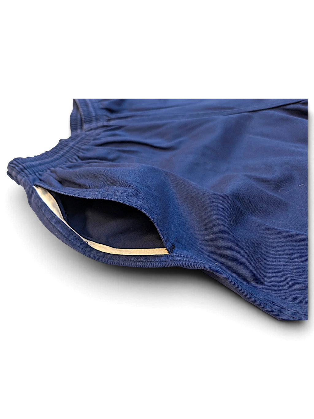 JAKE & IPI pre-owned Champion track pants in faded blue with a relaxed fit and side pocket detail.