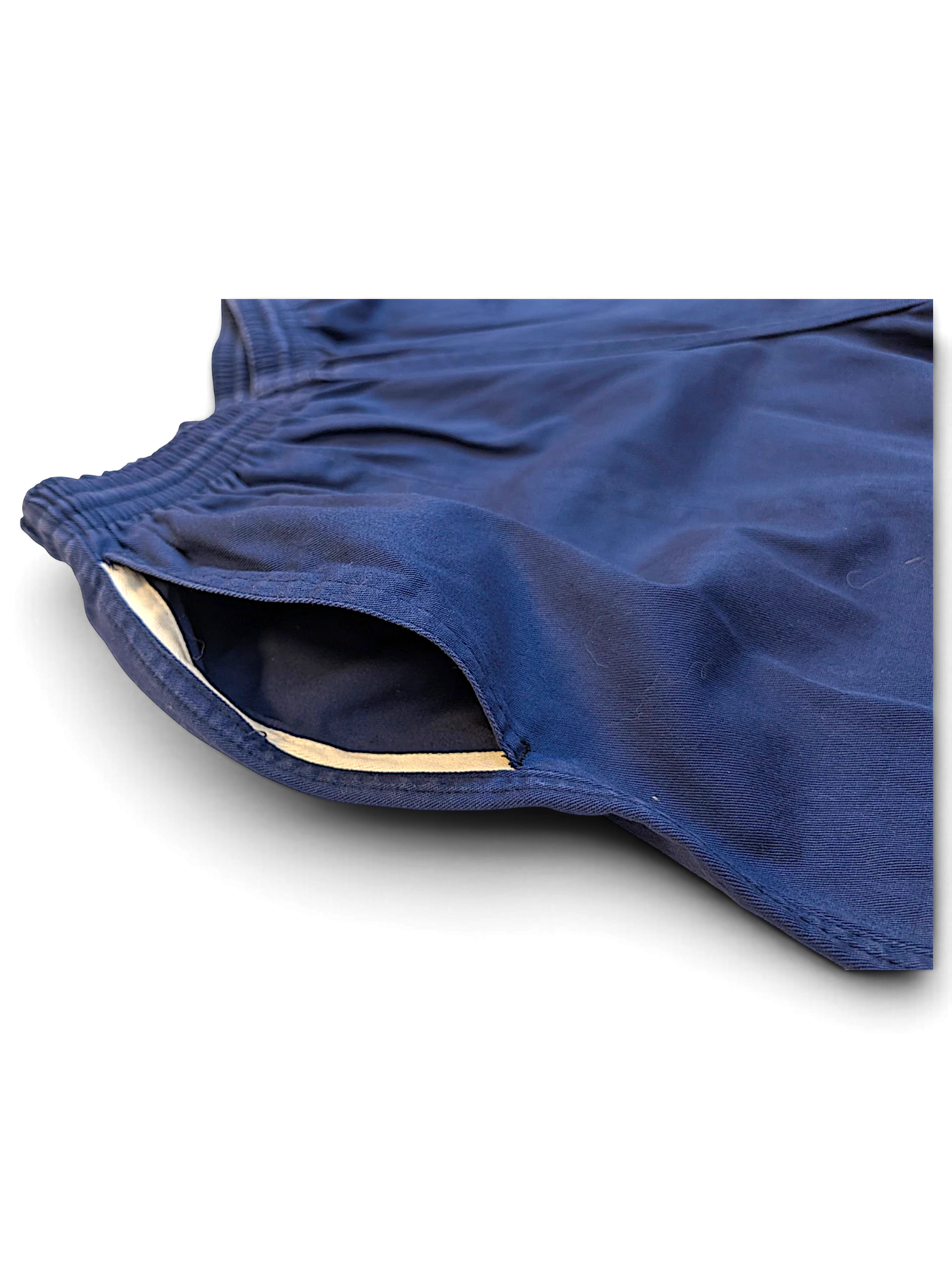 JAKE & IPI pre-owned Champion track pants in faded blue with a relaxed fit and side pocket detail.