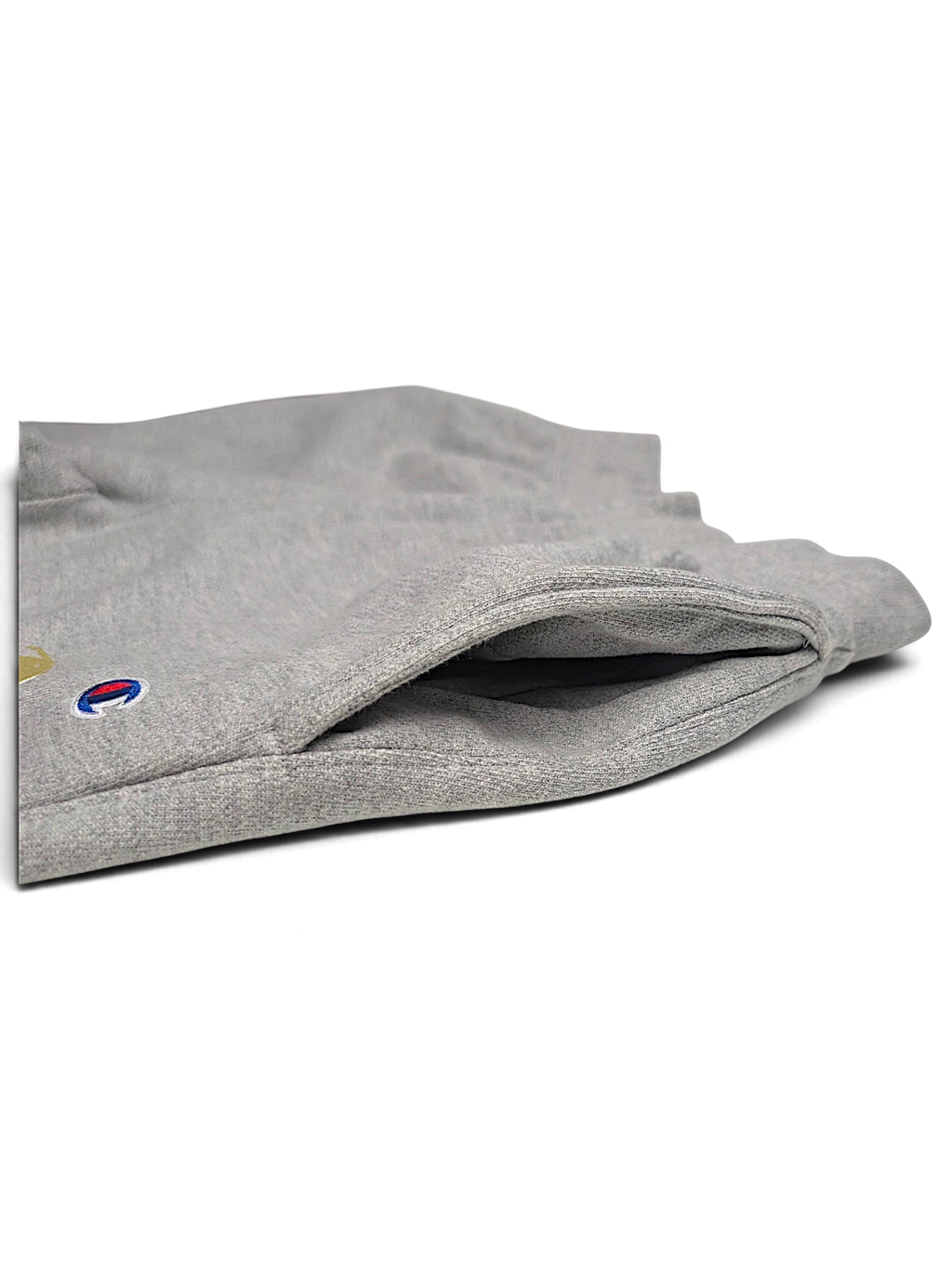 JAKE & IPI Champion Reverse Weave grey fleece joggers featuring a side pocket and embroidered logo detail