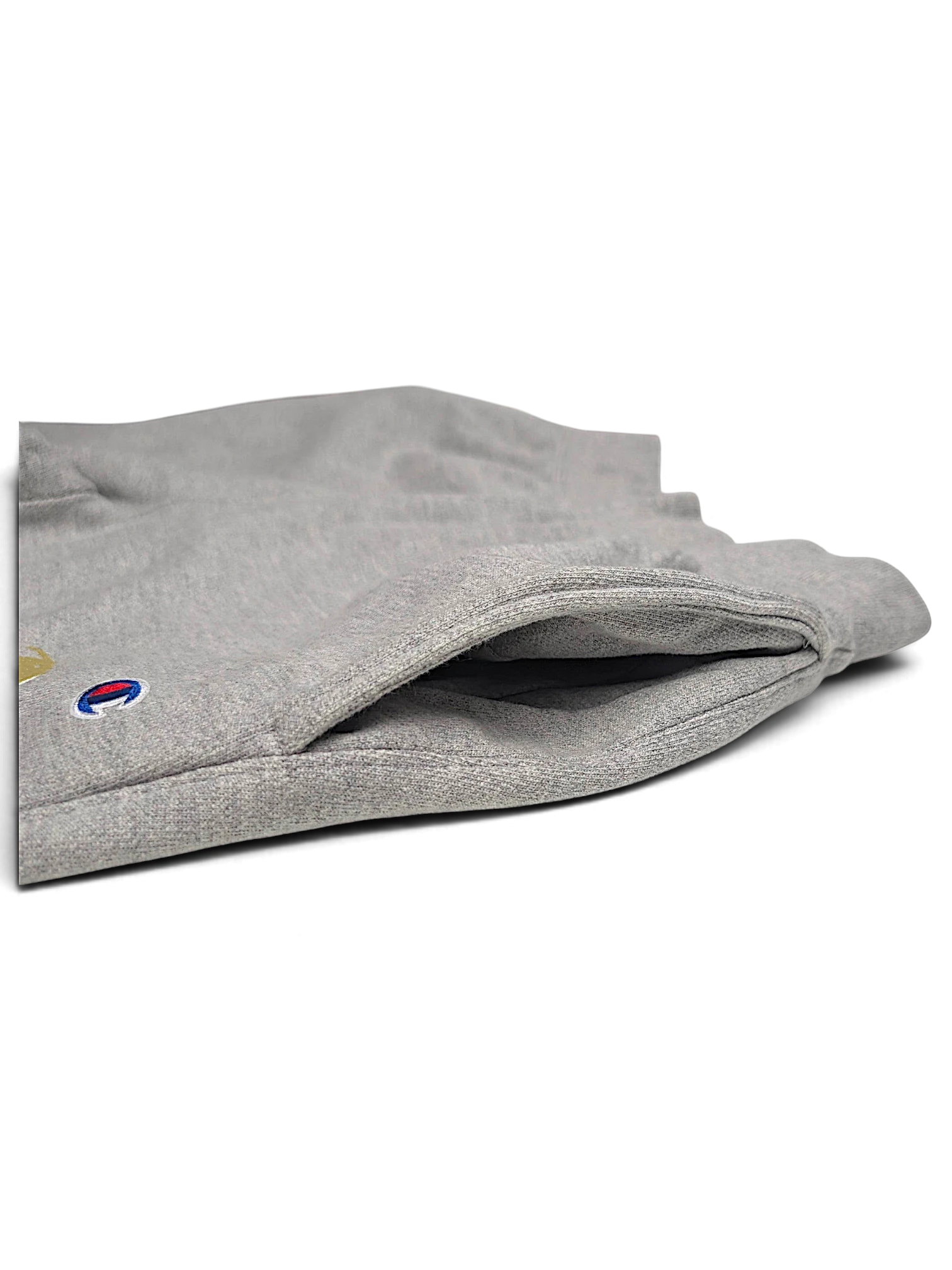 JAKE & IPI Champion Reverse Weave grey fleece joggers featuring a side pocket and embroidered logo detail