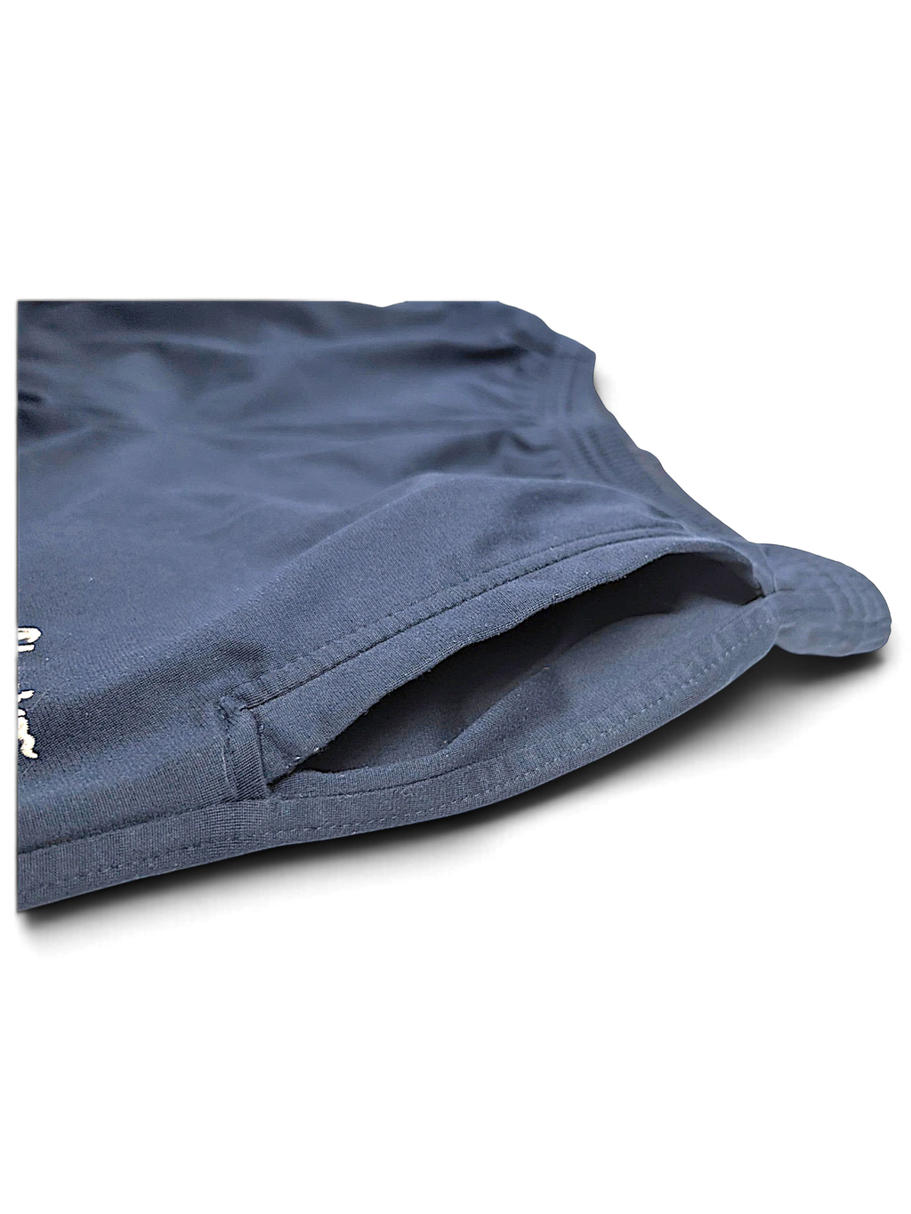 JAKE & IPI Champion navy blue track pants featuring a side pocket and embroidered logo detail