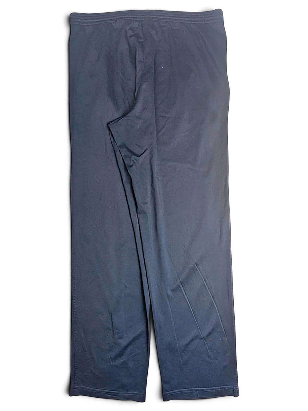 JAKE & IPI pre-owned Champion navy blue open-hem track pants with a comfortable relaxed fit.