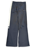 JAKE & IPI pre-owned Champion navy track pants with white side stripes and logo branding