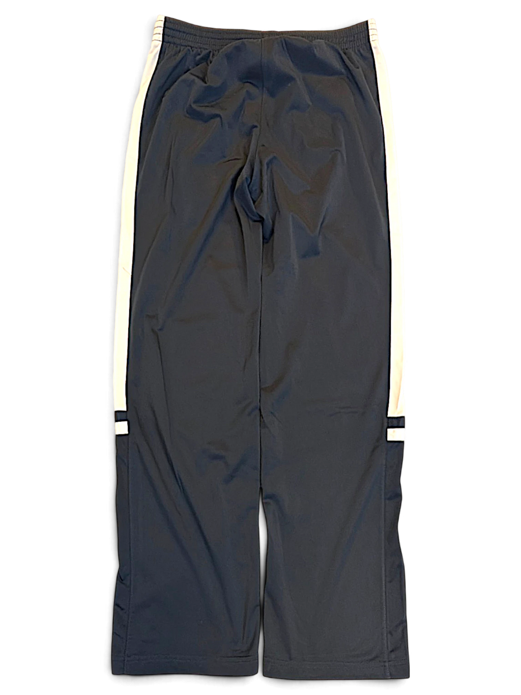 JAKE & IPI pre-owned Champion navy track pants with white side stripes and zip hems in size M