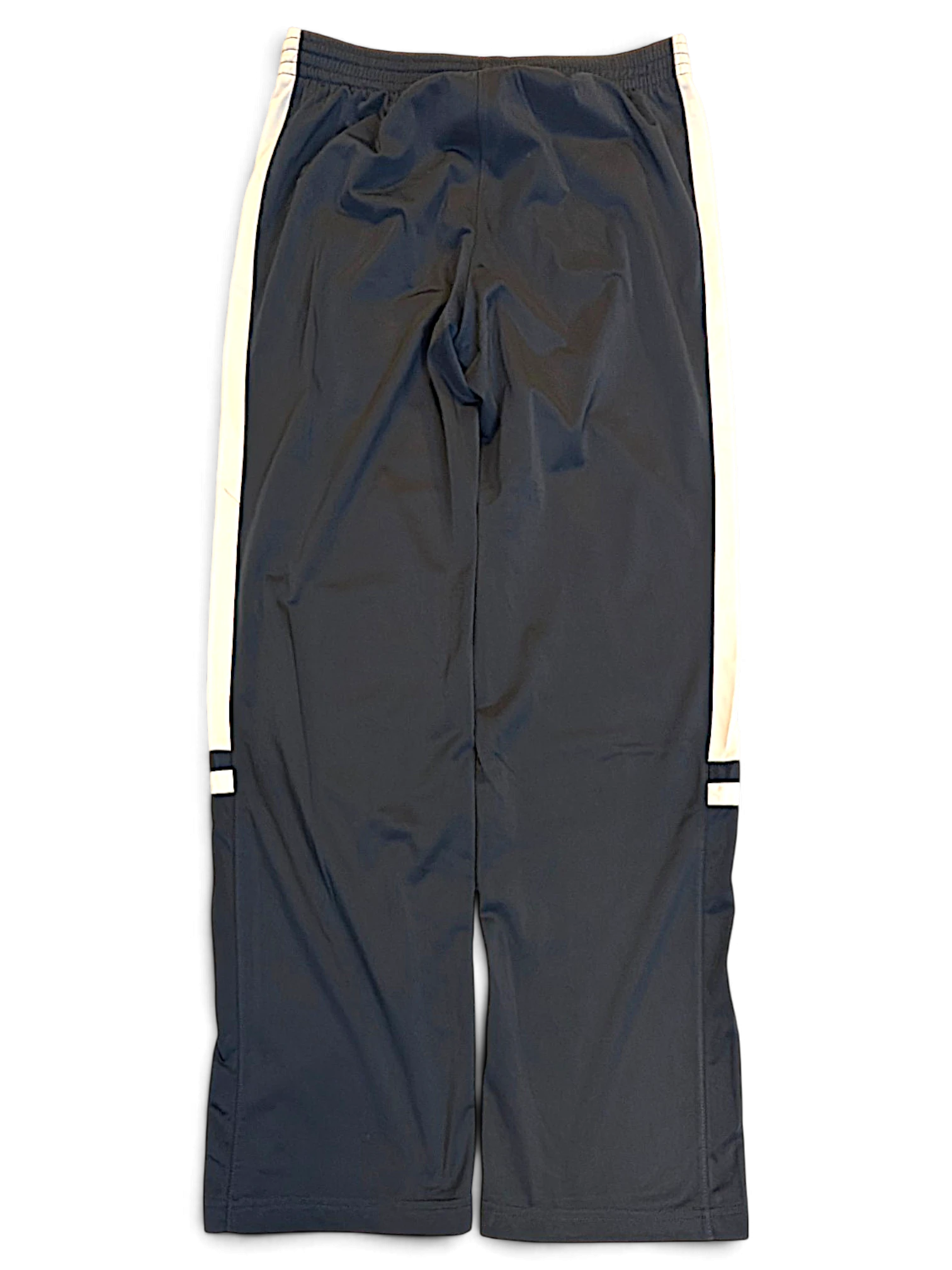 JAKE & IPI pre-owned Champion navy track pants with white side stripes and zip hems in size M