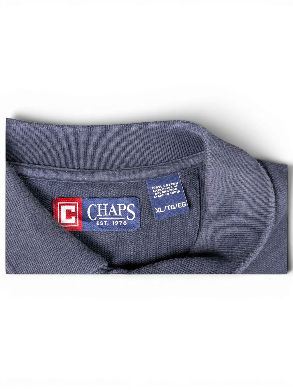 JAKE & IPI pre-owned navy blue Chaps polo shirt featuring a cotton fabric label and embroidered brand logo