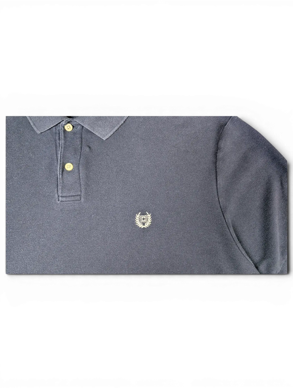 JAKE & IPI pre-owned navy Chaps polo shirt featuring a classic collar, button placket, and embroidered crest logo.