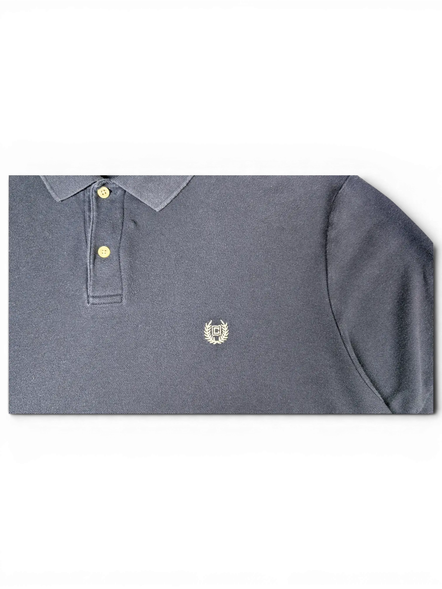 JAKE & IPI pre-owned navy Chaps polo shirt featuring a classic collar, button placket, and embroidered crest logo.