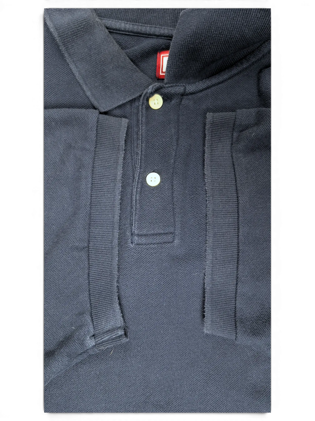 JAKE & IPI pre-owned navy Chaps polo shirt with a classic collar, two-button placket, and ribbed sleeve cuffs.