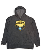 JAKE & IPI charcoal grey pullover hoodie featuring a Lake Ann Brewing CO graphic logo on the chest