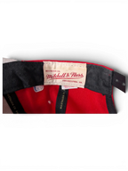 JAKE & IPI Chicago Bulls cap interior showing Mitchell & Ness branding and red fabric lining